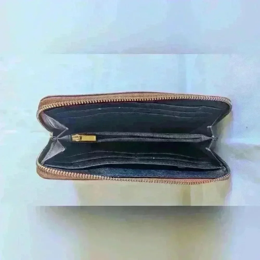 Brown Pebble Leather Fossil Zipper Wallet with Black Leathers Tassle